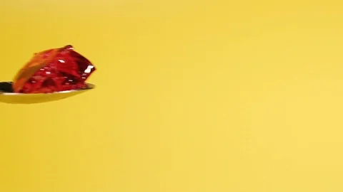 Dessert. Spoon with cherry jelly. Video stock 124521320