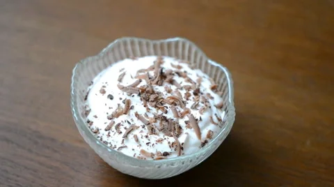 Dessert sprinkled with chocolate Stock Footage 59663110
