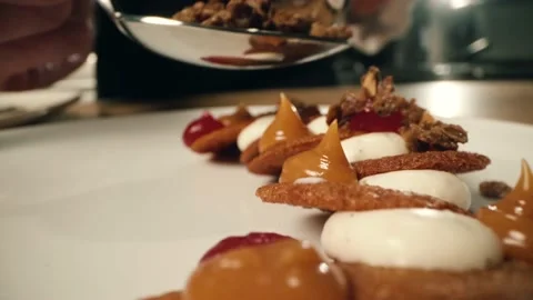 Dessert sprinkled with nuts Stock Footage 198899275