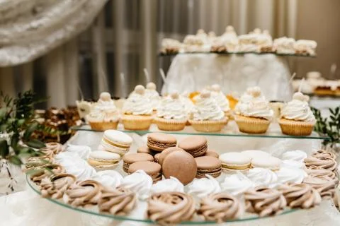 Dessert table for a party. Ombre cake, cupcakes, sweetness and f Stock Photos