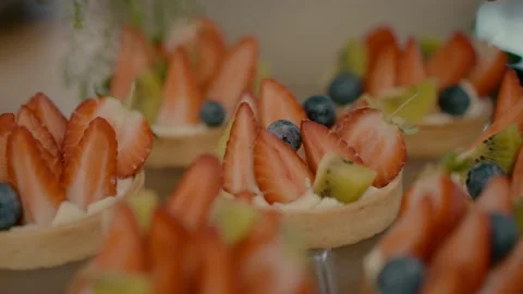 Desserts with berries on the tray. Stock Footage 233966624