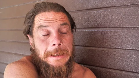 Destitute man talks on camera 動画素材 120360969