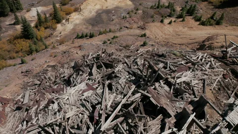 Destroyed and abandoned silver mine high up in the rocky mountains Stock Footage 149570274