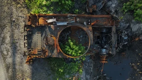 Destroyed and burned russian battle tank of the Russian invaders in Ukraine 2022 Stock Footage 205565232