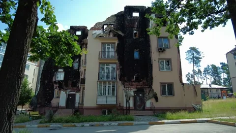A destroyed and burnt down apartment building in Irpin, Ukraine. Stock Footage 201186821