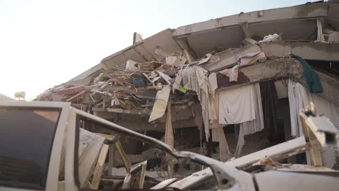 Destroyed and devastated buildings and cars in the city center Stock Footage 233224230