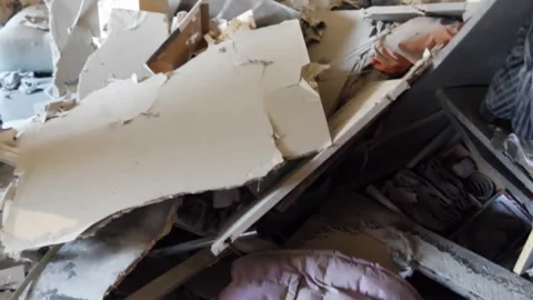 Destroyed apartment after being hit by a rocket shell Stock Footage 260738392