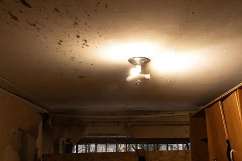 A destroyed apartment after a drone exploded under the window of a multi-st.. Stock Photos