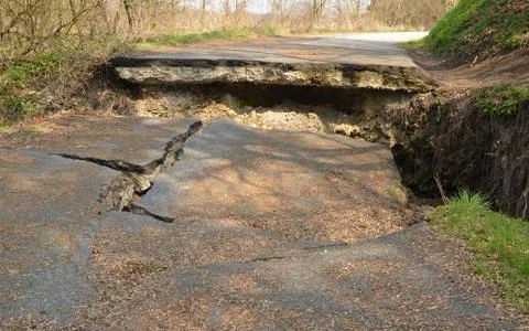 Destroyed asphalt road Stock Photos