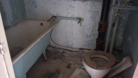 Destroyed bathroom in one of Pripyat residential house Stock Footage