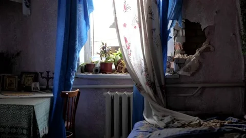 Destroyed bedroom of a house from a shell fired by Russian troops Stock Footage 196875861