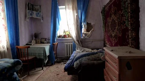 Destroyed bedroom of a house from a shell fired by Russian troops Stock Footage 196875866