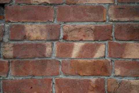 Destroyed brick wall, red texture grunge background Stock Photos