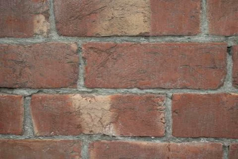 Destroyed brick wall, red texture grunge background Stock Photos