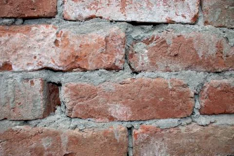Destroyed brick wall, red texture grunge background Stock Photos