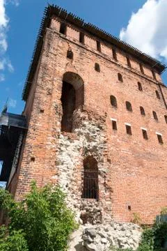 Destroyed brick wall with Windows. Abandoned old building. Stock Photos