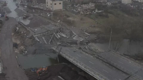 Destroyed bridge across the Irpin river. Evacuation of city dwellers. Stock Footage 179976890
