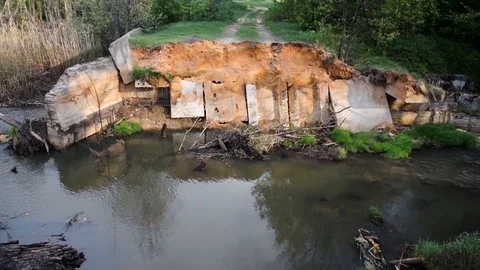 Destroyed bridge dam over the river 스톡 동영상 104554595