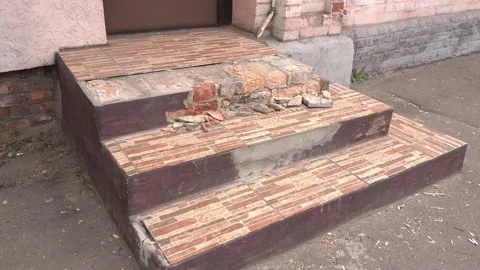 Destroyed broken porch and steps, close-up Stock Footage 314429048