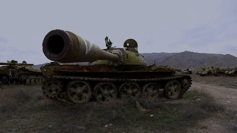 Destroyed broken Soviet tank left over from the Russians in Afghanistan Stock Footage 128016199