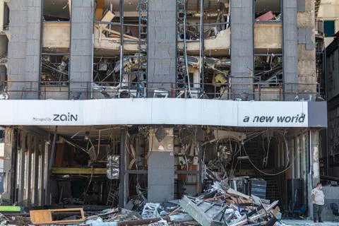 Destroyed building facing the massive explosion site at Beirut Port Stock Photos