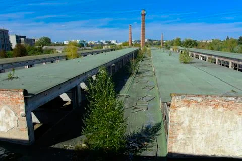 The destroyed building of the factory workshop, which worked in the defense i Stock Photos