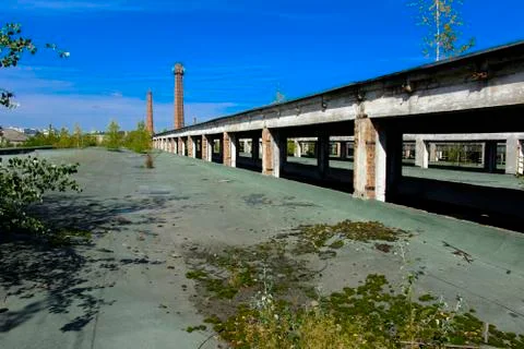 The destroyed building of the factory workshop, which worked in the defense i Stock Photos