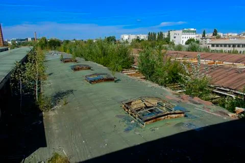 The destroyed building of the factory workshop, which worked in the defense i Stock Photos