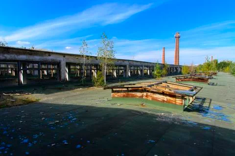 The destroyed building of the factory workshop, which worked in the defense i Stock Photos