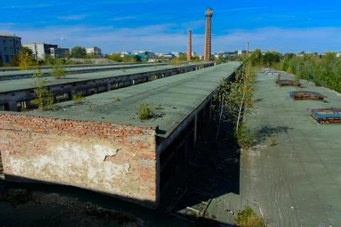 The destroyed building of the factory workshop, which worked in the defense i Stock Photos