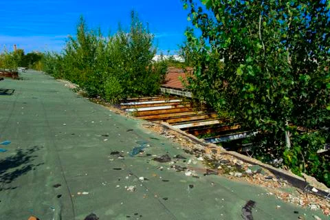The destroyed building of the factory workshop, which worked in the defense i Stock Photos