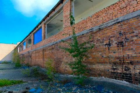 The destroyed building of the factory workshop, which worked for the defense Stock Photos