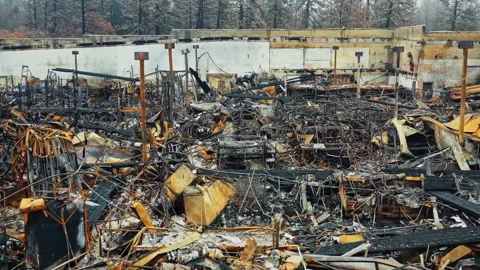 Destroyed building interior after a devastating fire 스톡 동영상 332960611