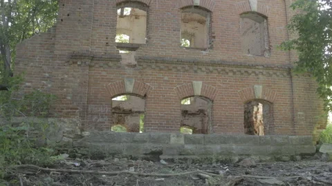 Destroyed building of red brick after the war. Stock Footage 97414229