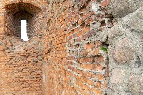 Destroyed building. Red brick castle built in the last century. Historical va Stock Photos