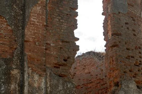 Destroyed building. Red brick castle built in the last century. Historical va Stock Photos