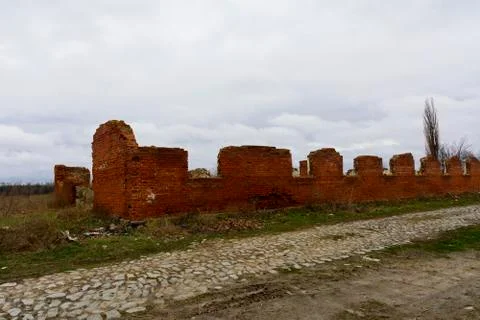 The destroyed building of a room for keeping cows near the village Stock Photos