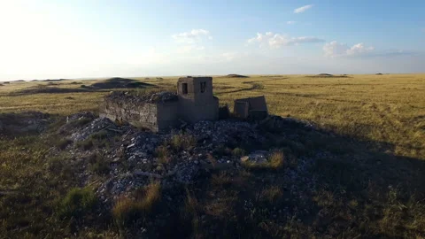 The destroyed building on the shooting range. Field near the town of Video stock 98781254