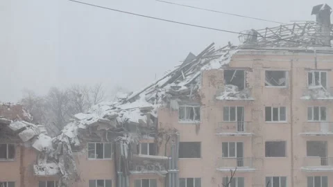 Destroyed building, winter day, first snow, war in Ukraine Stock Footage 256830753