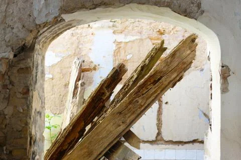 Destroyed ceiling holder in old castle Stock Photos