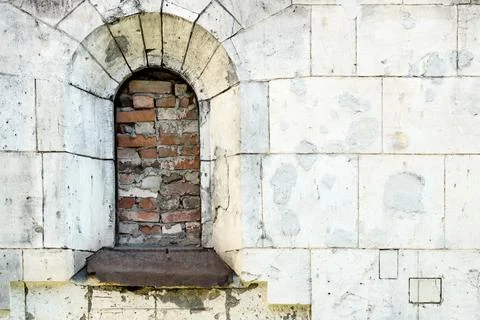 Destroyed facade of the ancient building Stock Photos