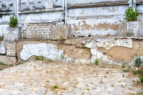 Destroyed fence foundation. Stock Photos