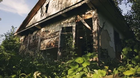 Destroyed homes by war turned into a pile of garbage Stock Footage 77236925