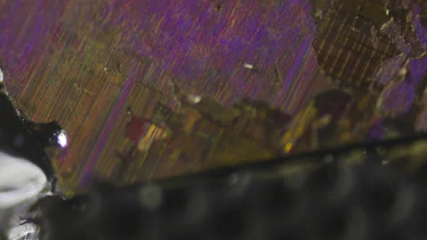 The destroyed microprocessor of a nuclear missile under a microscope. Artifacts  Stock Footage 190855611