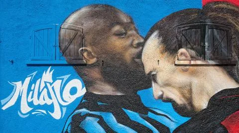 Destroyed mural depicting the clash between Ibrahimovic and Lukaku Stock Photos