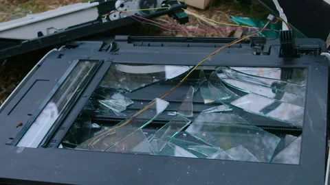 Destroyed Old Printer &amp; Scanner with broken glass in trash dump / heap Video stock 153564216