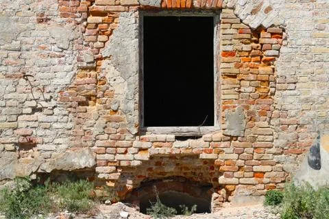 Destroyed old windows in castle Stock Photos