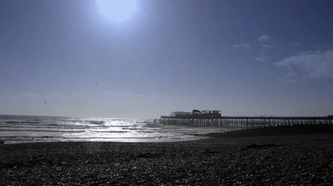 A Destroyed Pier on Beach with Blue Sky Stock Footage 34918222