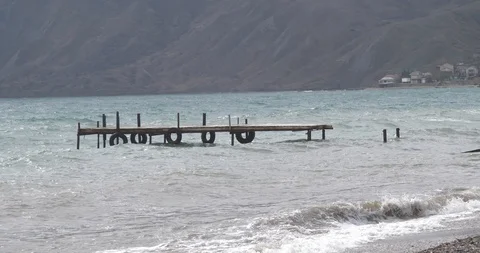 A destroyed pier in the sea Stock Footage 88442346