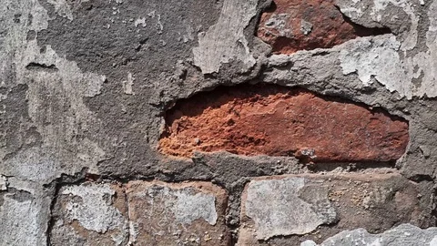 Destroyed plaster on red brick wall texture grunge background Stock Footage 128599134